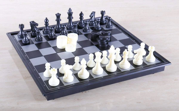 This is the product image for Magnetic Chess/Checkers Small. Detail: TRAVELLING. Product ID: TCS1.
 
				Price: $19.95.